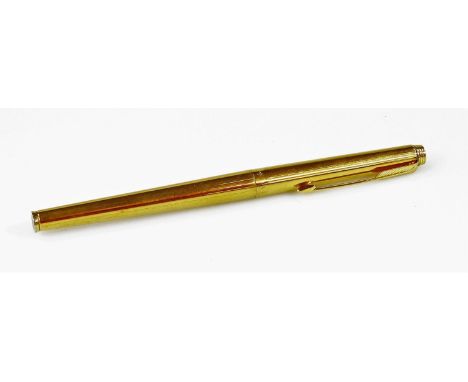A Parker 180 fountain pen, in gilt colours, with arrow clip and circular insert to the top, two coloured nib, 14cm W.  