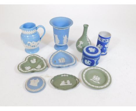 A collection of Jasper ware, Wedgwood and others, to include a cylindrical dark blue vase, 10cm H, raised with classical figu