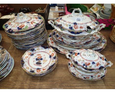 An oriental style design Dinner service comprising meat plate, six large dinner plates, six breakfast plates, five side plate