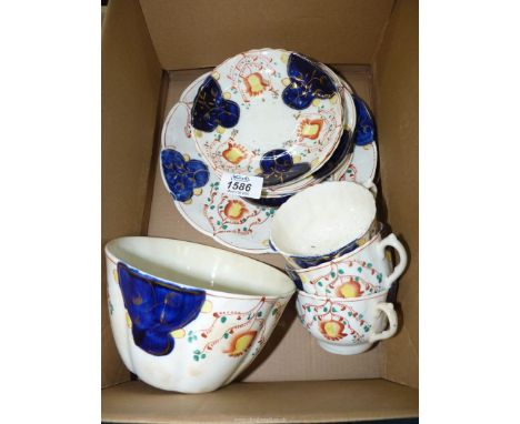 A small quantity of Gaudy Welsh china including cups, saucers, slop bowl, etc.