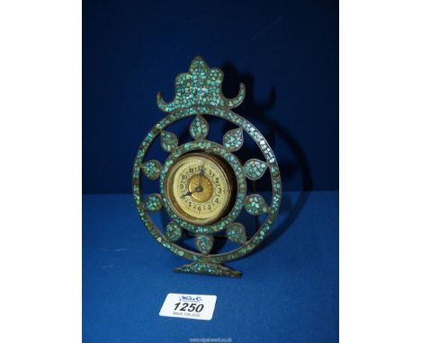 A small easel style Clock with a British United Clock Company style movement, (working at time of lotting), 6 3/4" tall.