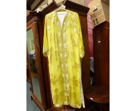 A vintage Marrakech yellow silk Kaftan, hand-stitched, satin under dress and with beaded embellishment.