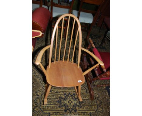 An Ercol stickback Rocking Chair.