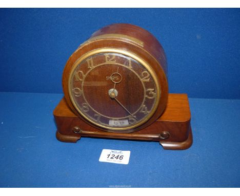 A wooden Smiths 8 day mantle clock with presentation plaque for 27th May 1950, 7 3/4" wide x 3" depth x 6" high.