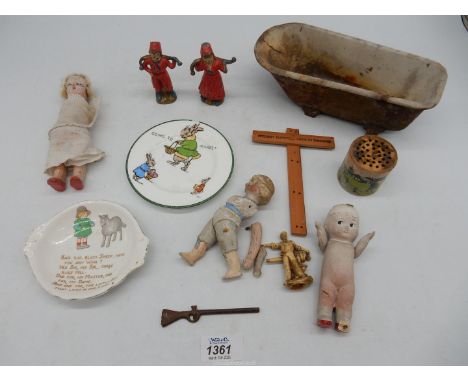 A quantity of vintage children's toys including cast iron bath, doll's house nursery china, etc.