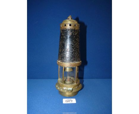 A brass and other metal Davy lamp marked "Hilop", 10" tall.
