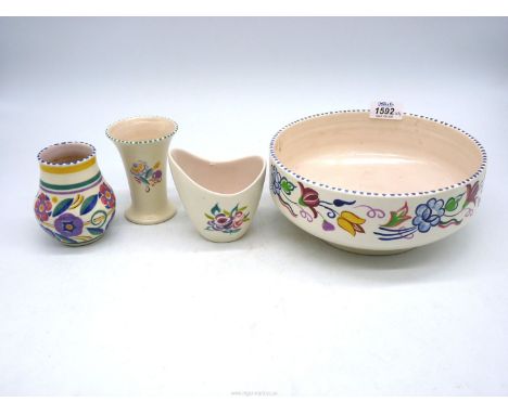 Four pieces of Poole Pottery including large bowl and three small Vases, two with older date stamp.