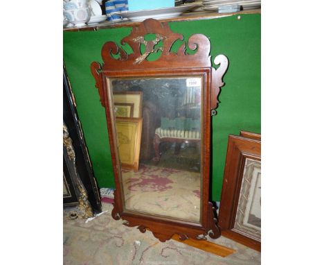 A 19th century mahogany framed Mirror with fretworked surround, 30 1/2" x 17" wide. 