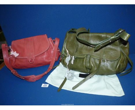 A large olive leather Radley Handbag with dustbag, tag and charms (used) and a dusty pink leather Radley Handbag with tag (so