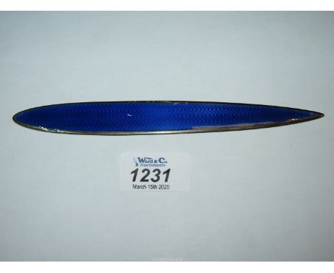 A 925 silver, and blue enamel page turner.