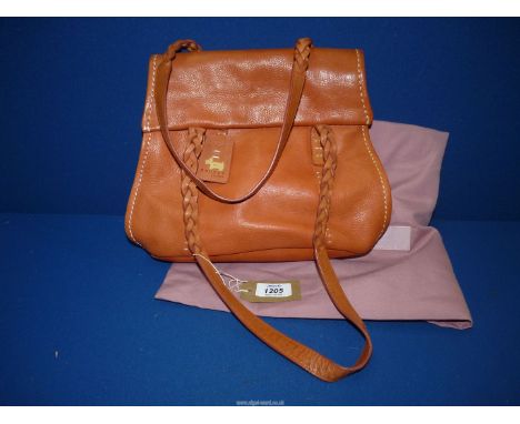 A tan leather Radley Handbag with tag and dust bag.