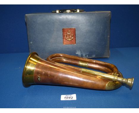 A Boosey & Hawkes copper and brass Bugle, cased.