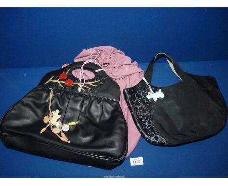 A black leather Radley Handbag with tag, charms and top decoration, "Cherry" with mustard lining and a small black Radley Han