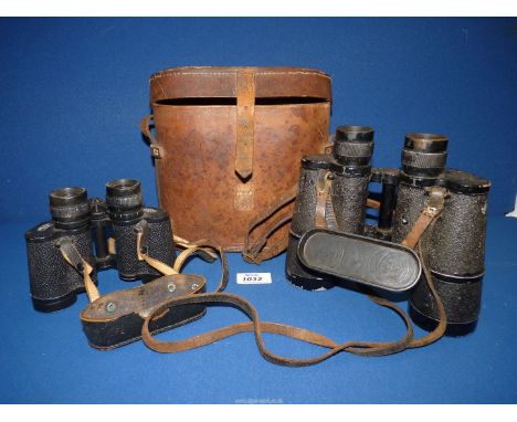 A pair of Carl Zeiss WWII Binoculars 8 x 30 and a pair of Dienstglas WWII Binoculars 10 x 50, no. 2216097.