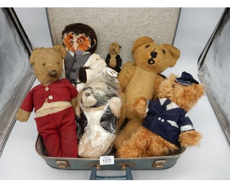 A suitcase of vintage teddy bears, DROWL' aviator bear, 1920's miniature 'Farnell Alpha Toys' panda.