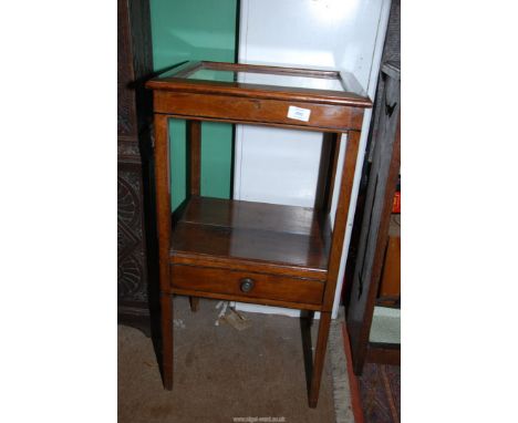 An Oak and Mahogany display Table, the legs united by a lower shelf with a drawer, 16" x 13 3/4" x 30" high.