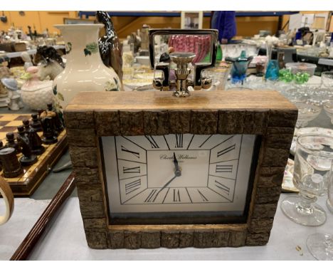 A WOODEN ,CHARLES WILLIAMS' MANTLE CLOCK HEIGHT 20CM 