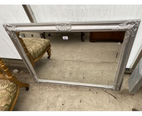 A MODERN SILVER GILT FRAMED WALL MIRROR, 38 X 30" 