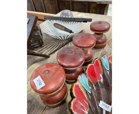 A GROUP OF FOUR VINTAGE RED PAINTED DOOR KNOBS 