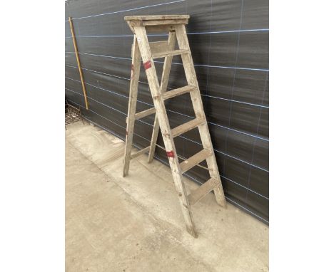 A SET OF VINTAGE HARDWOOD FOLDING STEP LADDERS 