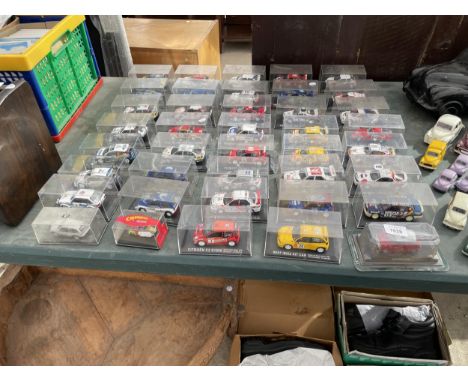 A LARGE QUANTITY OF BOXED MODEL CARS AND VEHICLES 