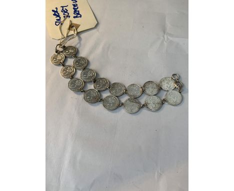 A SILVER JOEY BRACELET 
