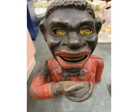 A VINTAGE 'JOLLY MAN' MONEY BANK 