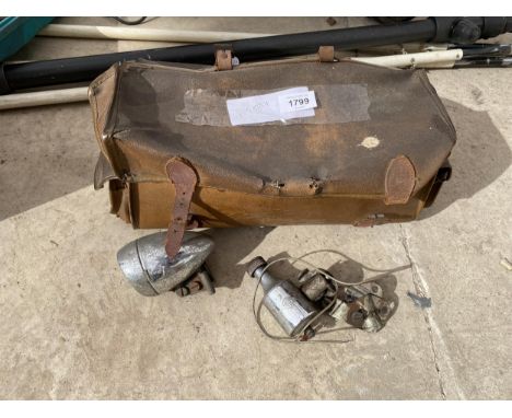 A VINTAGE LEATHER BAG AND AN ASSORTMENT OF BIKE SPARES 