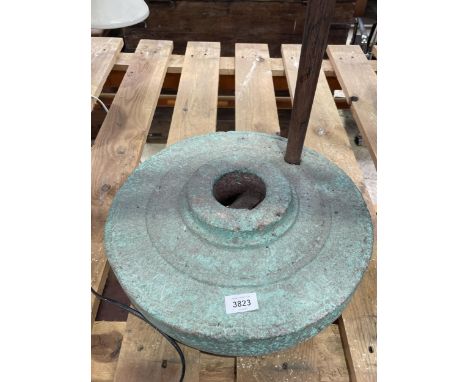 A VINTAGE INDIAN STONE PARASOL BASE 