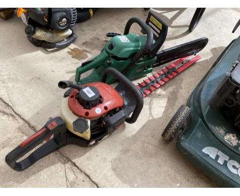 A MOUNTFIELD PETROL HEDGE TRIMMER AND A PETROL CHAINSAW 