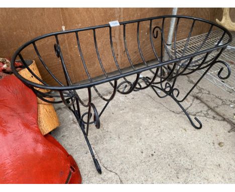 A WROUGHT IRON HAYRACK TROUGH PLANTER ON LEGS (L:76CM) 