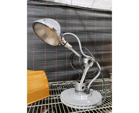 A SCRATCH BUILT ADJUSTABLE LAMP USING AUTOMOBILE SPARES 