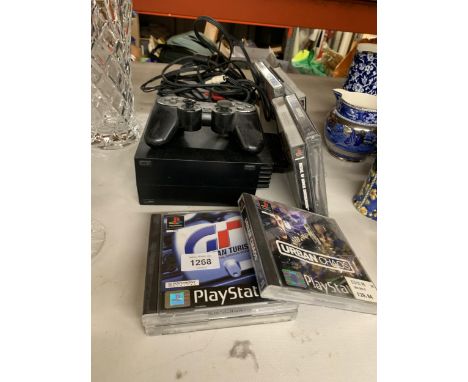 A PLAYSTATION 2 CONSOLE WITH CONTROLLER AND GAMES TO INCLUDE MEDAL OF HONOUR UNDERGROUND, 007 THE WORLD IS NOT ENOUGH, GRAN T