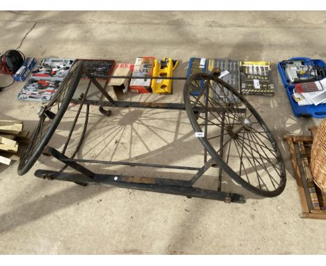 A VINTAGE METAL TWO WHEELED CART 