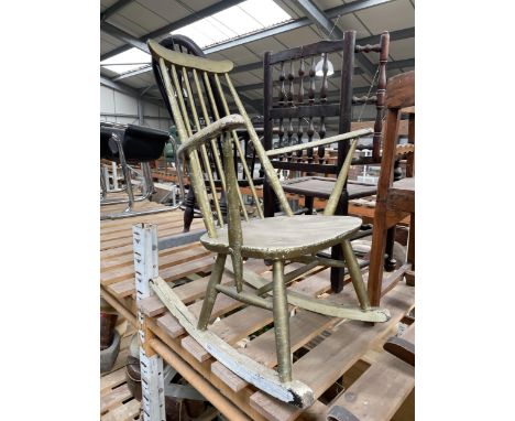 A GOLD PAINTED ERCOL STYLE ROCKING CHAIR 