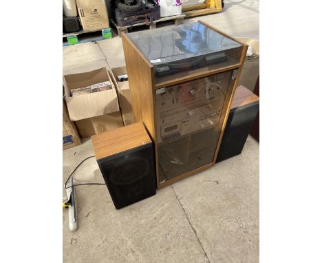 A TEAK STEREO CABINET WITH AMSTRAD AMPLIFIER, CASSETTE DECK AND RECORD PLAYER TO ALSO INCLUDE TWO SPEAKERS 