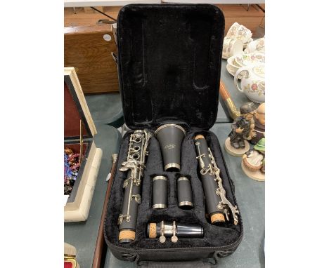 AN SMS ACADEMY BLACK CLARINET IN A FITTED SOFT CASE 