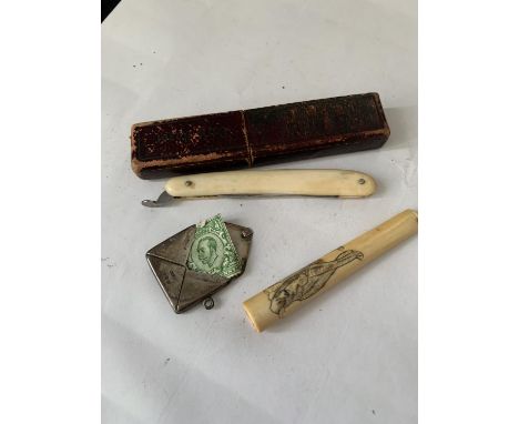 THREE VINTAGE ITEMS TO INCLUDE A BONE CHEROOT HOLDER, A HALLMARKED SILVER STAMP CASE AND A BOXED POCKET KNIFE 