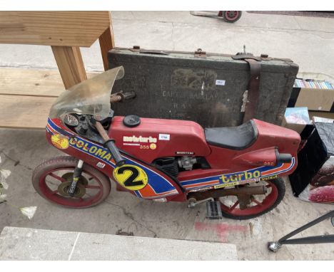 A VINTAGE CHILDS PEDAL BIKE IN THE FORM OF A MOTORBIKE 