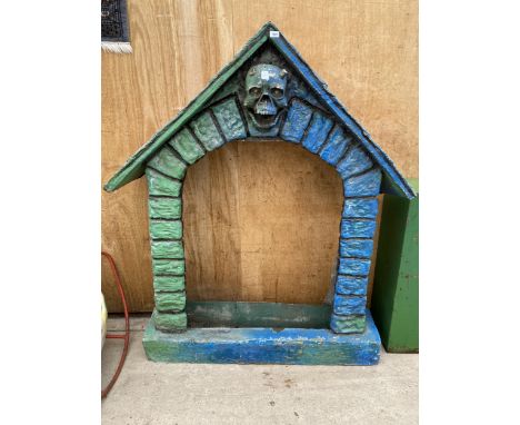 A VINTAGE FIBRE GLASS HAUNTED HOUSE FAIRGROUND DISPLAY 