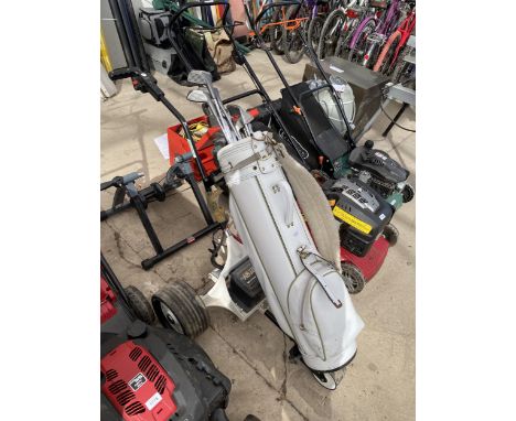 A POWERKADDY CLASSIC GOLF TROLLEY, A VINTAGE GOLF BAG AND GOLF CLUBS 