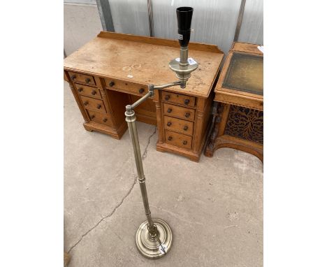 A METAL STANDARD LAMP 
