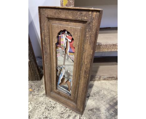 A VINTAGE INDIAN HARDWOOD MIRROR (GLASS A/F) 