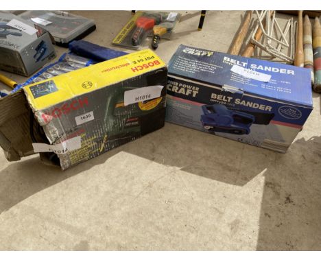 A BOSCH ELECTRIC JIGSAW AND A POWERCRAFT BELT SANDER 
