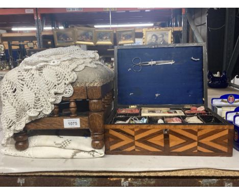 A VINTAGE WOODEN SEWING BOX WITH ACCESSORIES TOGETHER WITH TWO TAPESTRY WOVEN KNEELING STOOLS, LACE AND LINEN 
