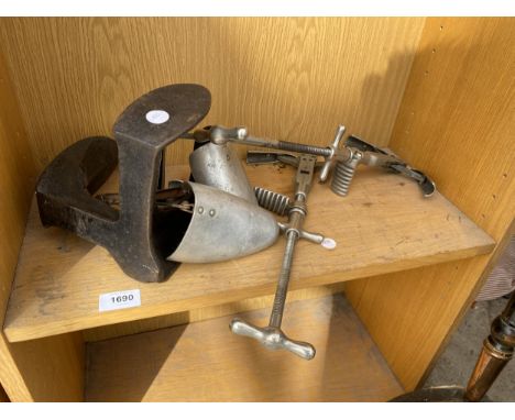 A VINTAGE COBBLERS LAST AND SHOE STRETCHERS 