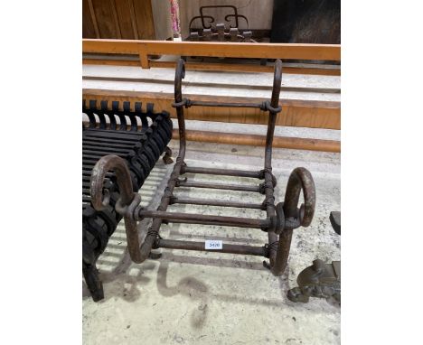 A VINTAGE METAL LOG BASKET 