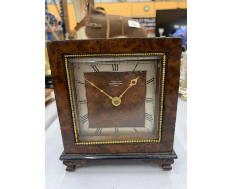 A PRE 1936 BURR WALNUT MANTLE CLOCK WITH KEY - MARKED SEARLE &amp; CO, LOMBARD STREET, LONDON 