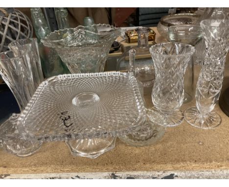 A LARGE QUANTITY OF GLASSWARE TO INCLUDE A CAKE STAND, TRINKET POT, VASES, CANDLESTICK ETC., 
