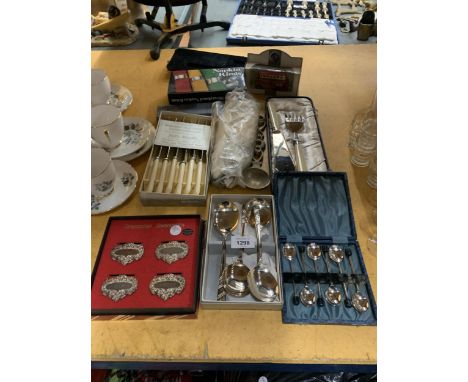 A QUANTITY OF CUTLERY TO INCLUDE LARGE VINTAGE KNIFE AND FORK ALONG WITH EPNS SPOONS ETC ALL BOXED 